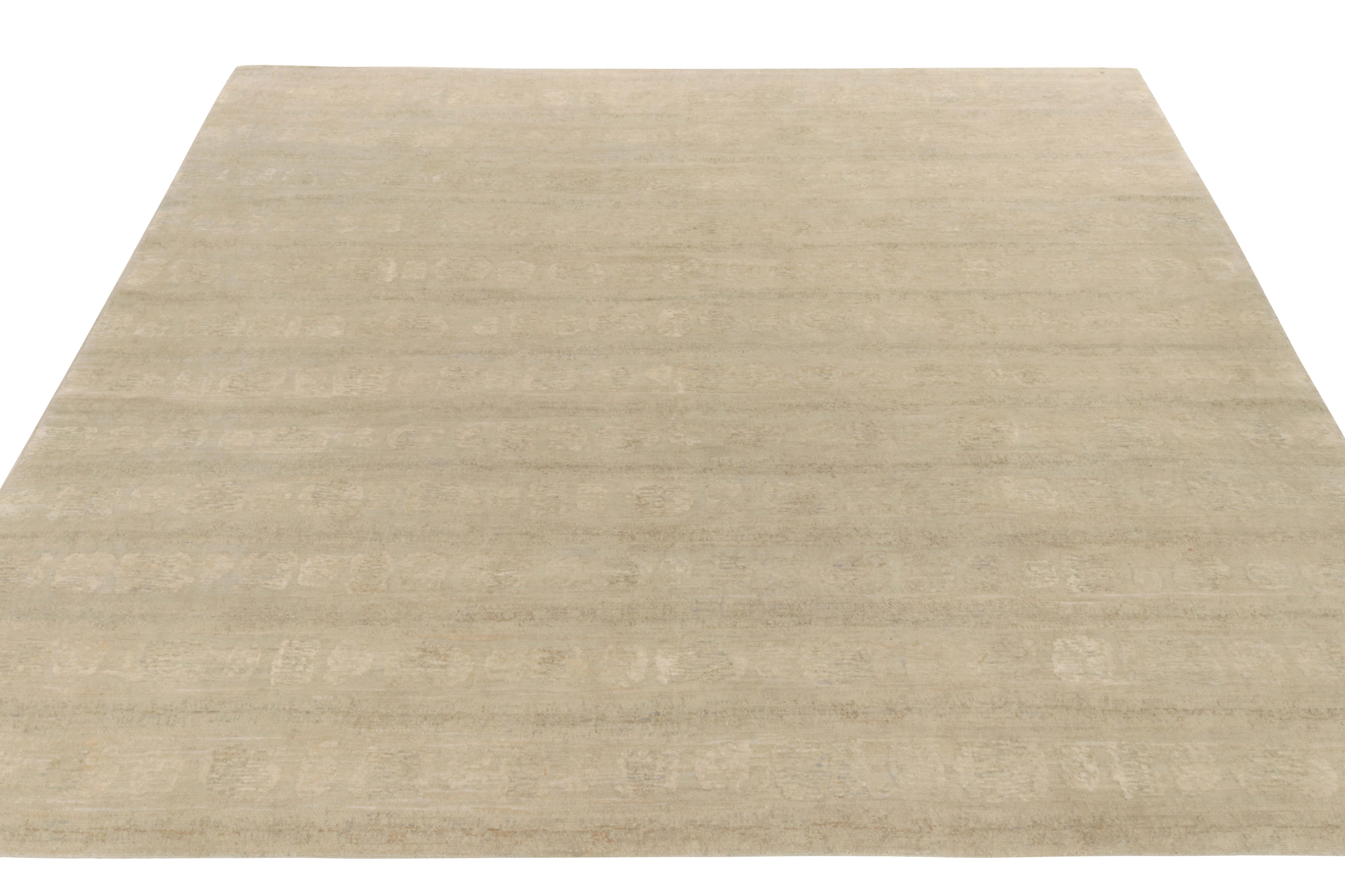 From Rug & Kilim’s Texture of Color selections, a hand-knotted square rug embracing modern sensibilities on neutrals and subtle accents. The 11x11 rug comfortably plays positive negative in tones of beige & grey with subdued green hues for a quiet