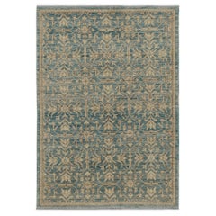 Rug & Kilim's Contemporary Rug in Blue with Beige-Brown Floral Patterns (Tapis contemporain en bleu avec motifs floraux beige et marron)