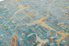 Rug & Kilim’s Contemporary Rug in Blue, with Brown and Gold Floral Patterns