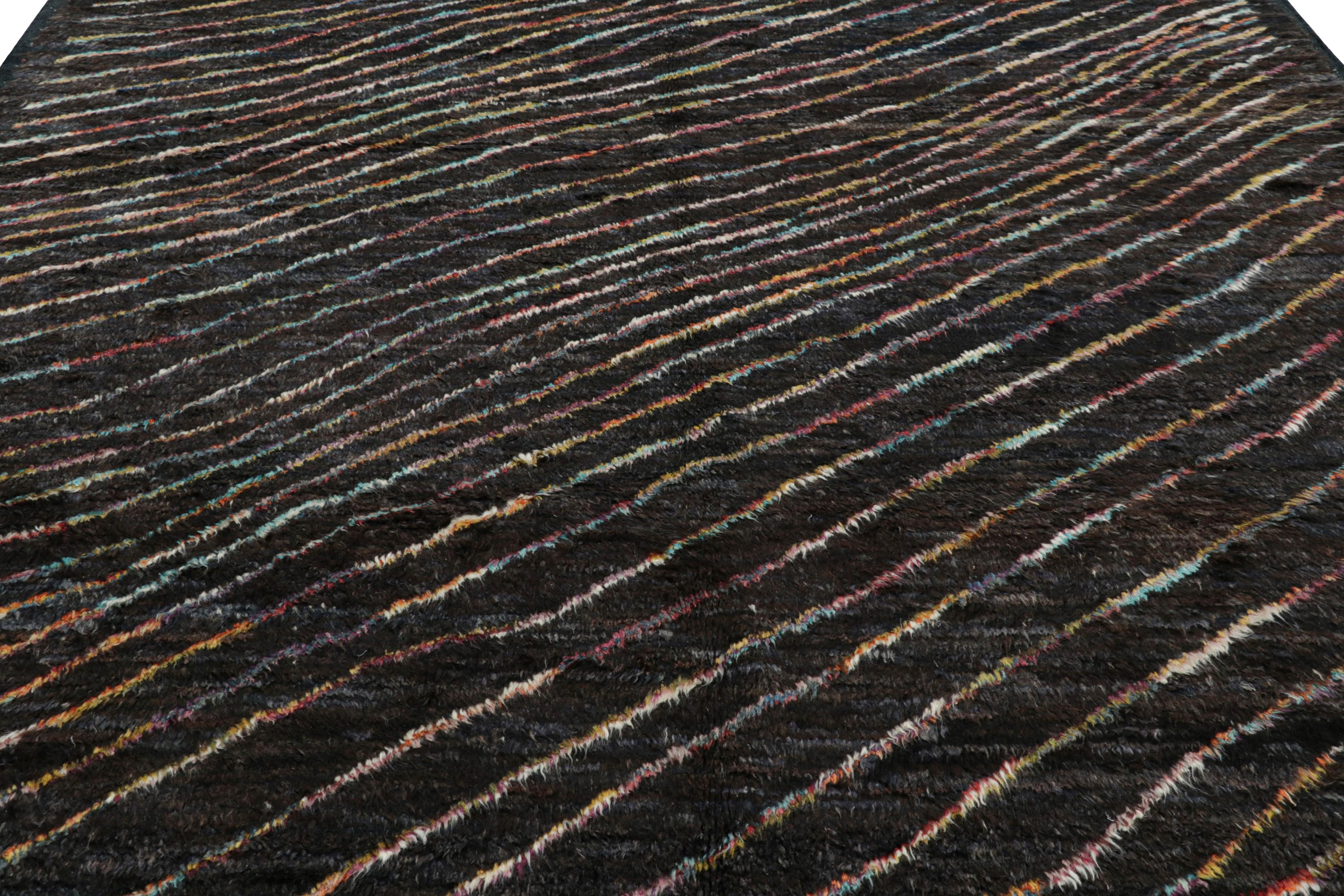 Hand-knotted in wool, this 9x10 contemporary rug is the latest addition to Rug & Kilim’s coveted Modern Collection.  

On the Design: 

Rich brown tones underscore this all over pattern, in which keen eyes will admire a wide range of bright hues in