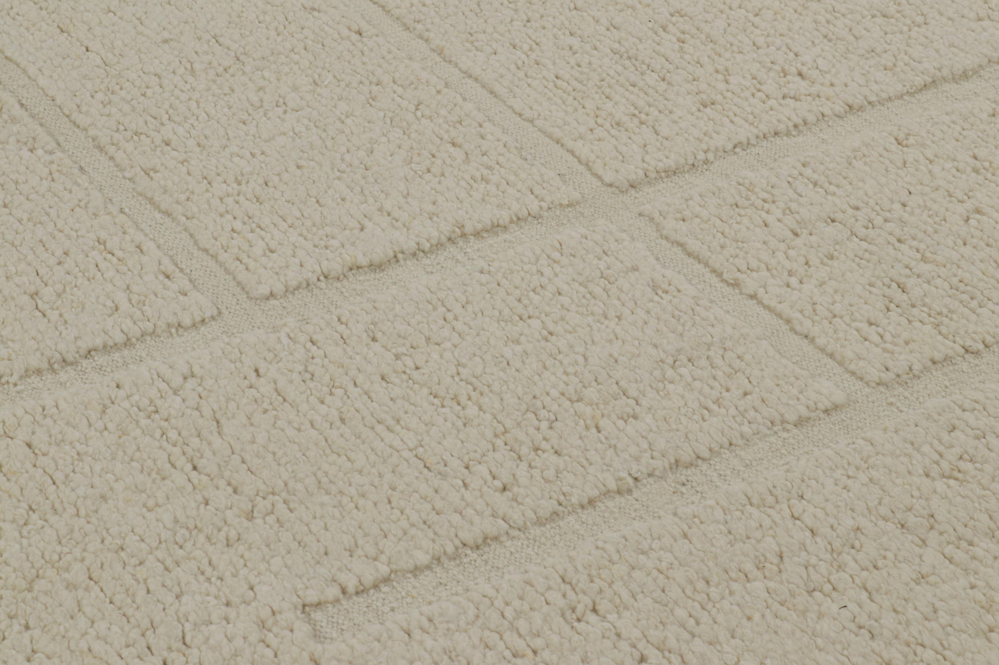 Annodato a mano in lana, questo tappeto 8x10 di Rug & Kilim presenta sottili variazioni di colore e una struttura a bouclè che conferisce un favoloso senso di dimensione ai motivi geometrici in tonalità crema. 

Sul design: 

Gli ammiratori