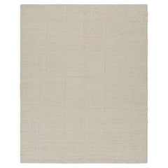 Rug & Kilim's Contemporary-Teppich in Cremeweiß mit geometrischen Hoch-Tief-Mustern