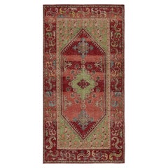 Tappeto contemporaneo Rug & Kilim in rosso, con medaglioni e motivi geometrici