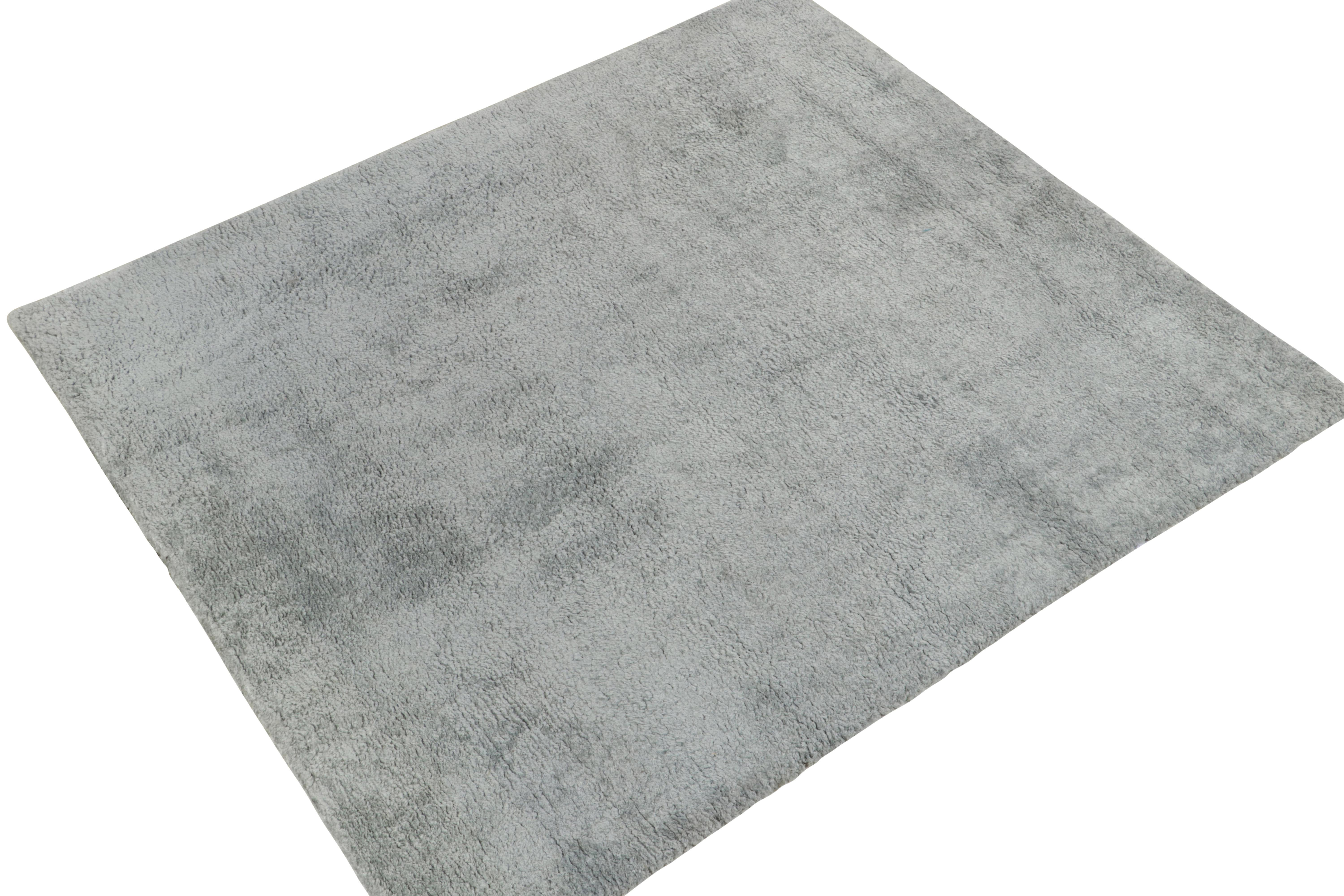 Hailing from Rug & Kilim’s Texture of Color collection, this 7x8 rug highlights our principal Josh’s passion for innovating tone-on-tone, patternless patterns in luxury rugs. Hand knotted in silk, the shag pile flourishes in a rich solid gray-blue