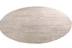 Rug & Kilim’s Texture of Color Custom Circle Rug Design in Solid Grey