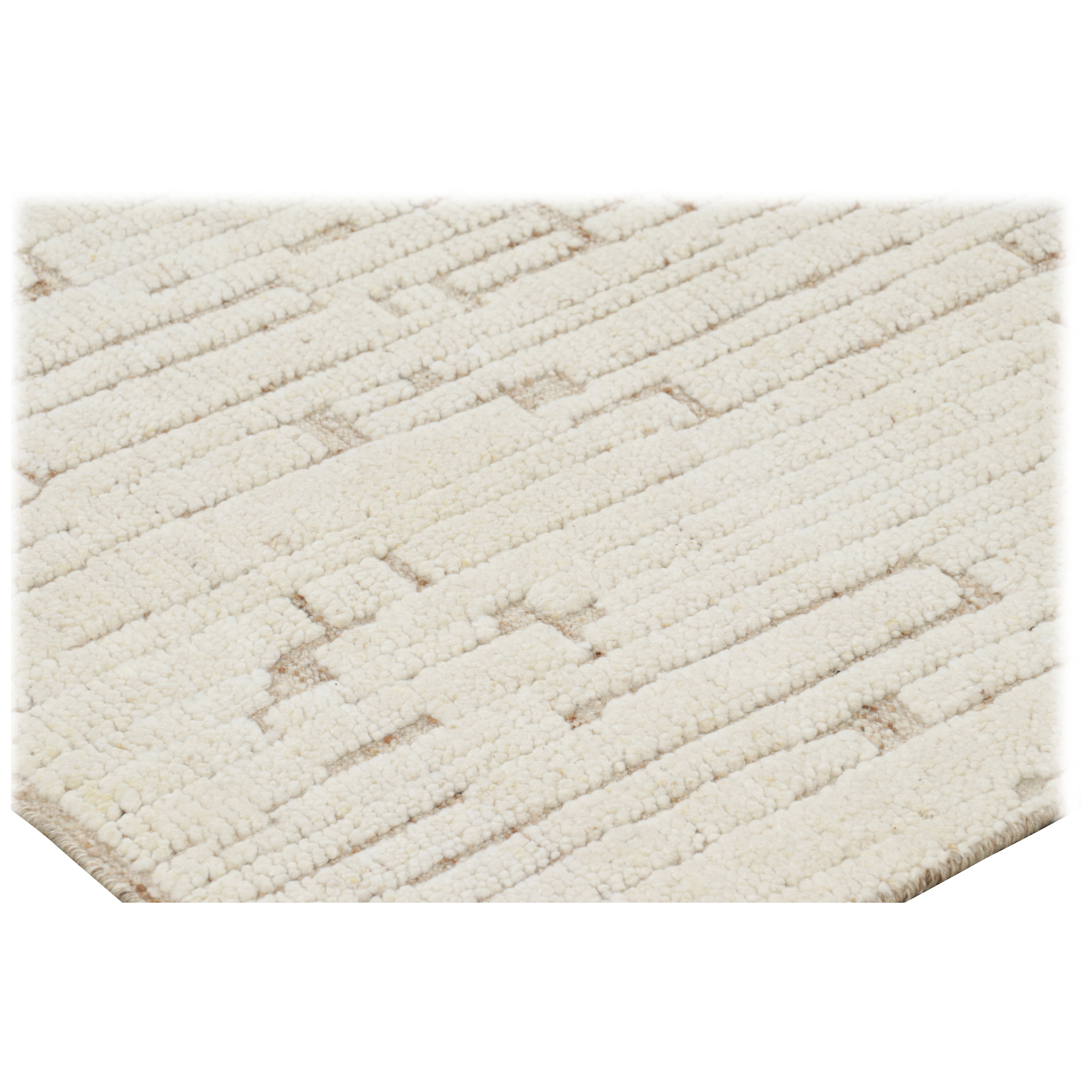 Dieser 8x10 große, handgeknüpfte Wollteppich gehört zu einer aufregenden neuen Linie in der Modern Collection'S von Rug & Kilim, die ein Zusammenspiel von schlichtem Design und komplizierten Strukturelementen bietet. Jedes Stück zeichnet sich durch