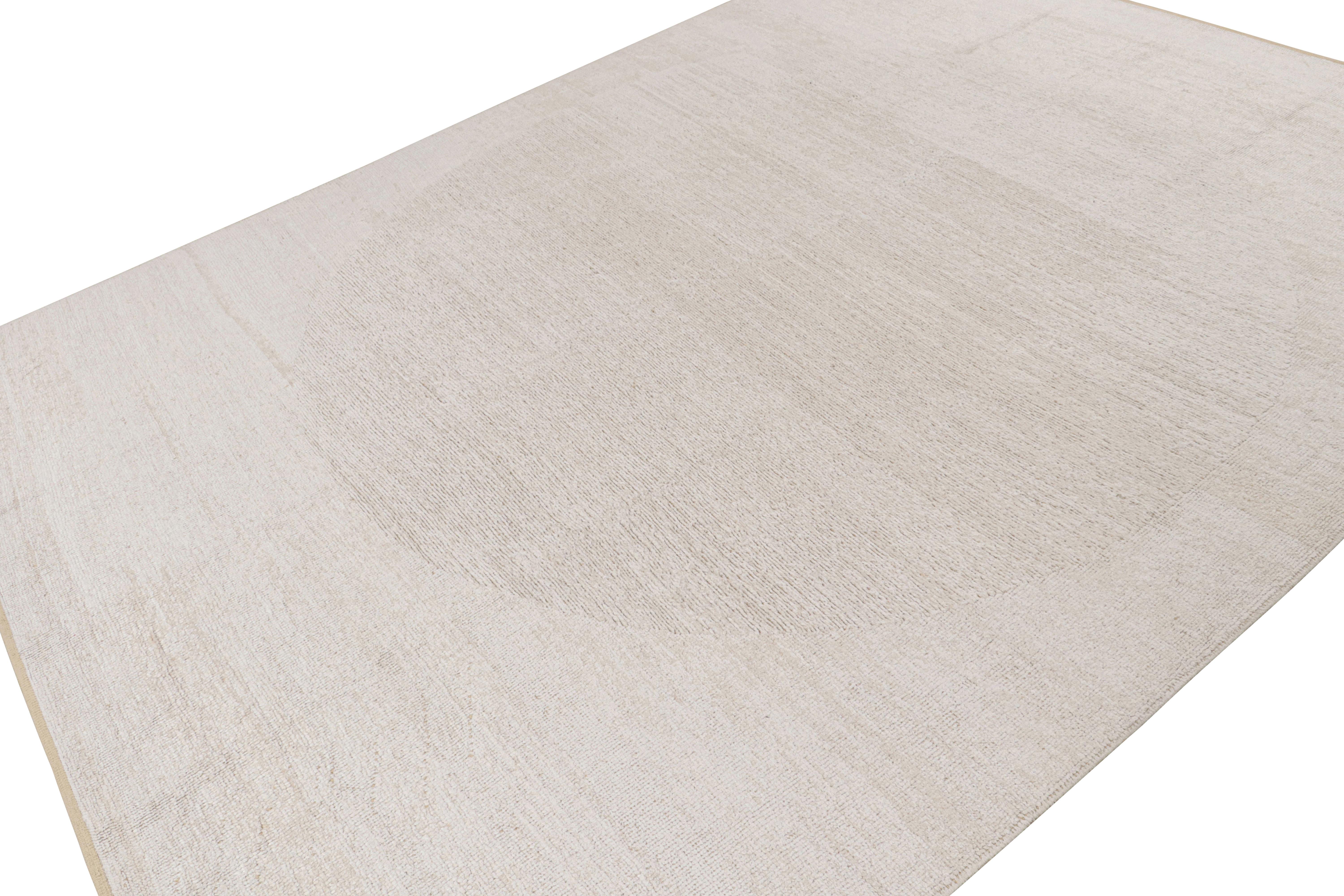 Annodato a mano in lana, questo tappeto contemporaneo 9x12 