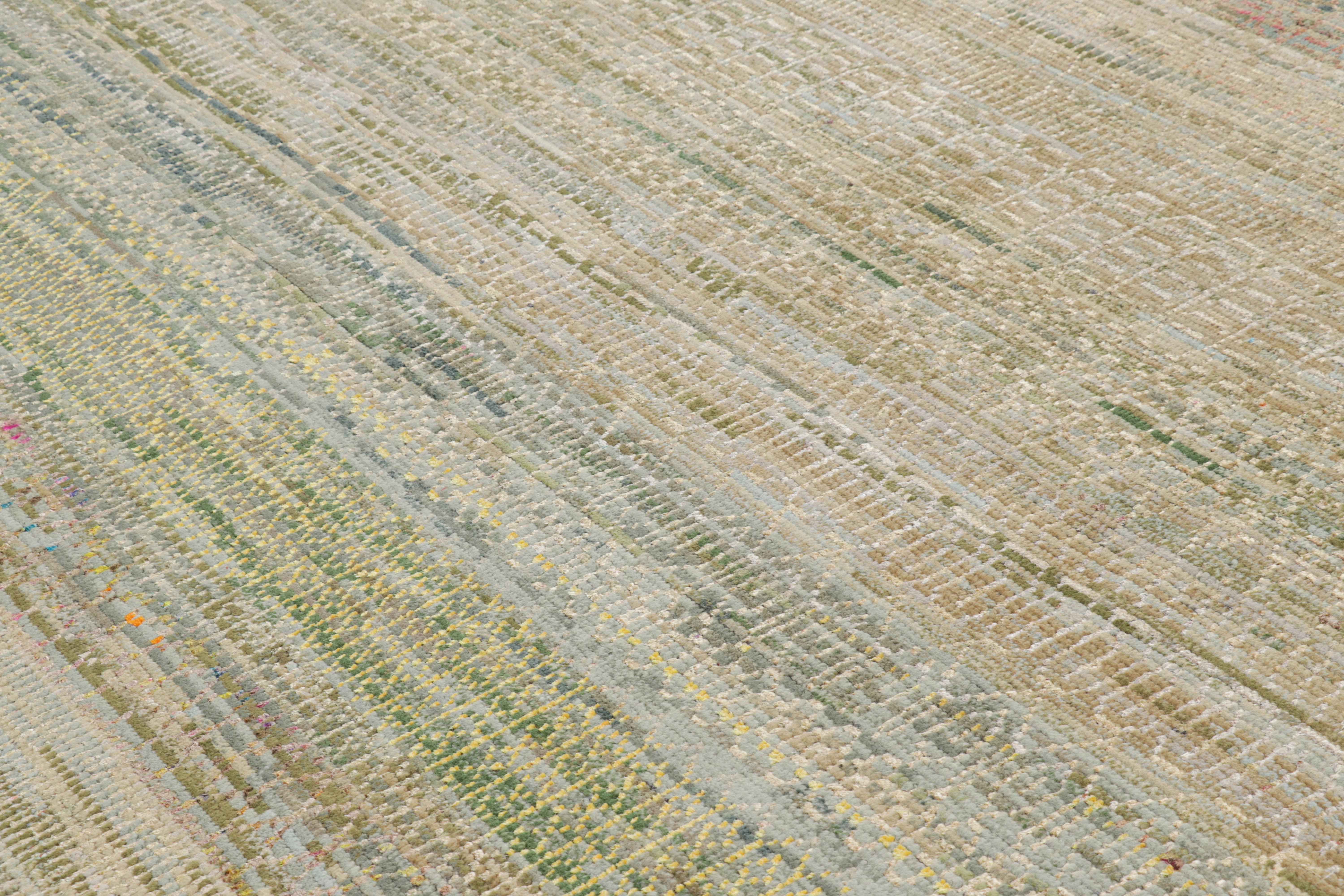 Anudada a mano en lana y seda, esta alfombra contemporánea de 8x10 pertenece a una nueva y emocionante línea de la Colección Moderna de Rug & Kilim, con una impresionante gama de colores y atención al movimiento en su juego único de rayas y sutiles