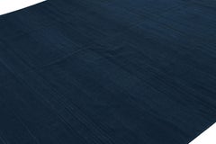 Rug & Kilim’s Contemporary Solid Dhurrie Rug in Indigo Tones