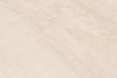 Rug & Kilim’s Contemporary Solid Rug in Tone-on-Tone Off-White and Ivory
