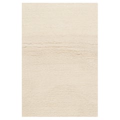 Rug & Kilim’s Contemporary Solid Rug in Tone-on-Tone Off-White and Ivory