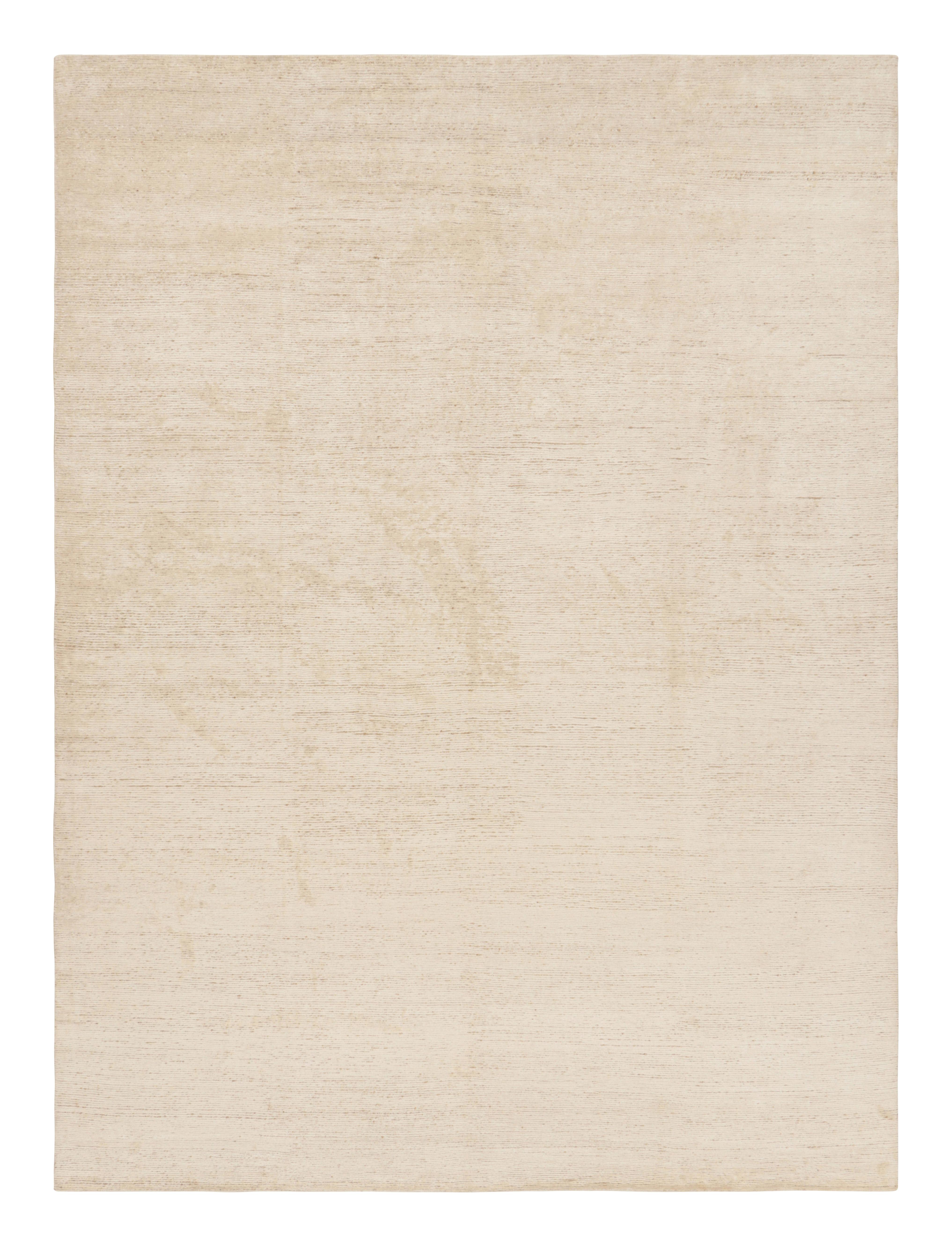 Hand-knotted in silk, this 9x12 contemporary rug from Rug & Kilim’s Texture of Color line is an inventive take on solid rugs with a striae. 

On the Design: 

The Texture of Color collection enjoys an inventive take on plain rugs, with this
