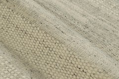 Rug & Kilim’s Contemporary Textural Rug in Cream and Gray Tones