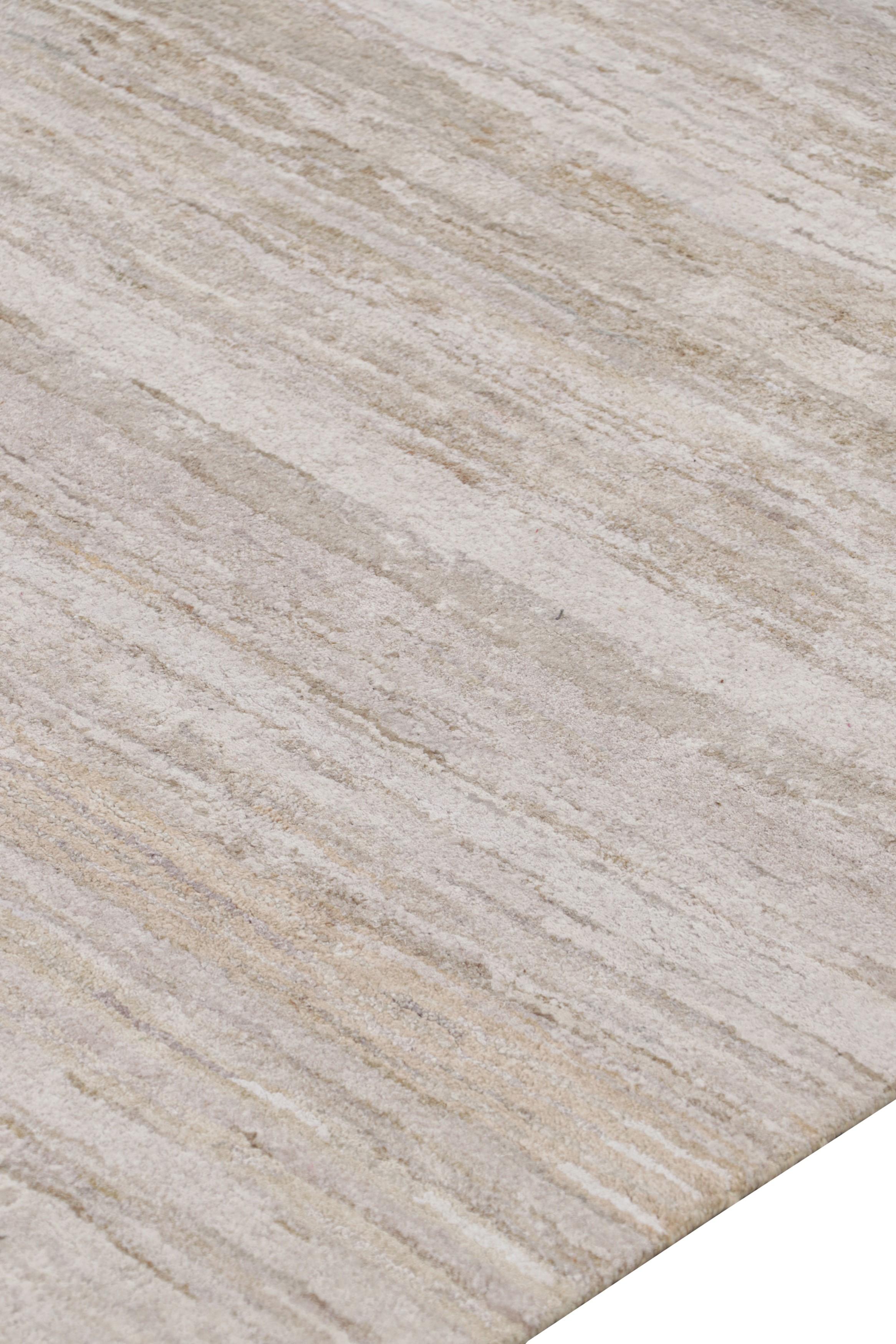 Made with hand-knotted silk, this 8x10 contemporary rug is a rich new addition to Rug & Kilim’s Textural rug collection—with an impressive range of colors and attention to movement in its unique play on stripes, striae, and subtle patterns.

On the