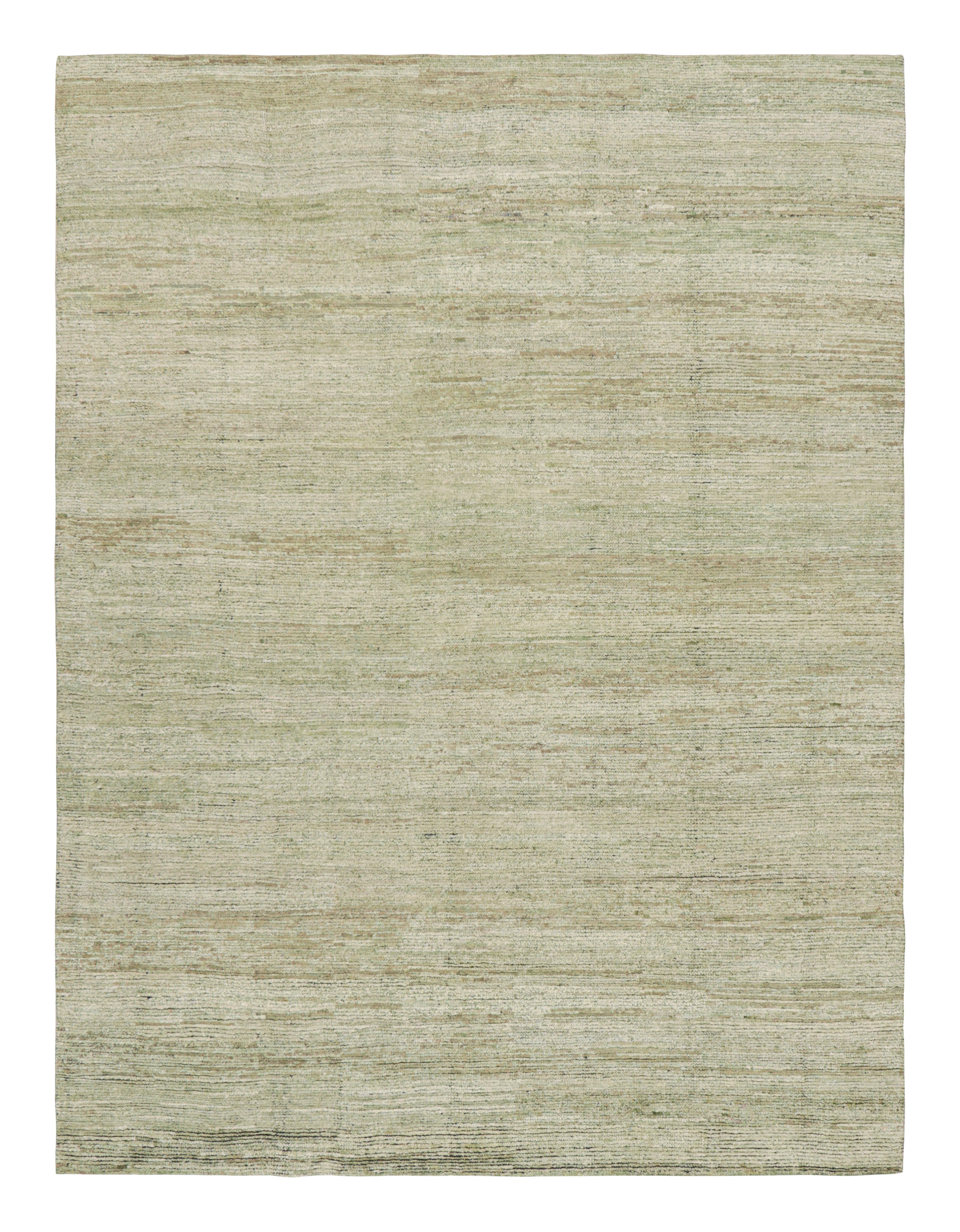Hand-knotted in wool and silk, this 8x10 textural rug by Rug & Kilim enjoying beige-brown and green high low stripes ad striae, is from our very special partner loom known for their lush, luxurious quality and contemporary designs. 

On the Design: