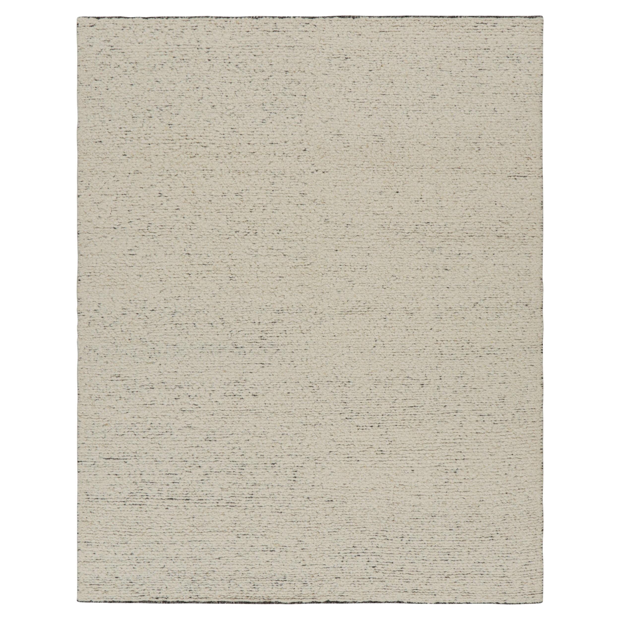 Rug & Kilim è un tappeto contemporaneo dai toni beige-marroni.