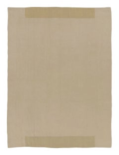 Rug & Kilim’s Contemporary Textural Solid Kilim in Beige and Cream Tones