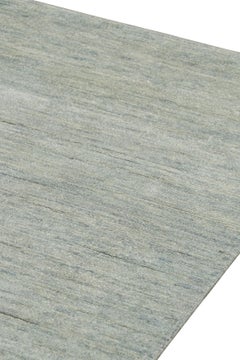 Rug & Kilim’s Contemporary Textural Solid Rug in Blue and Cream with Striae