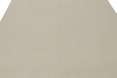 Rug & Kilim’s Contemporary Textural Solid Rug in Ivory Tones