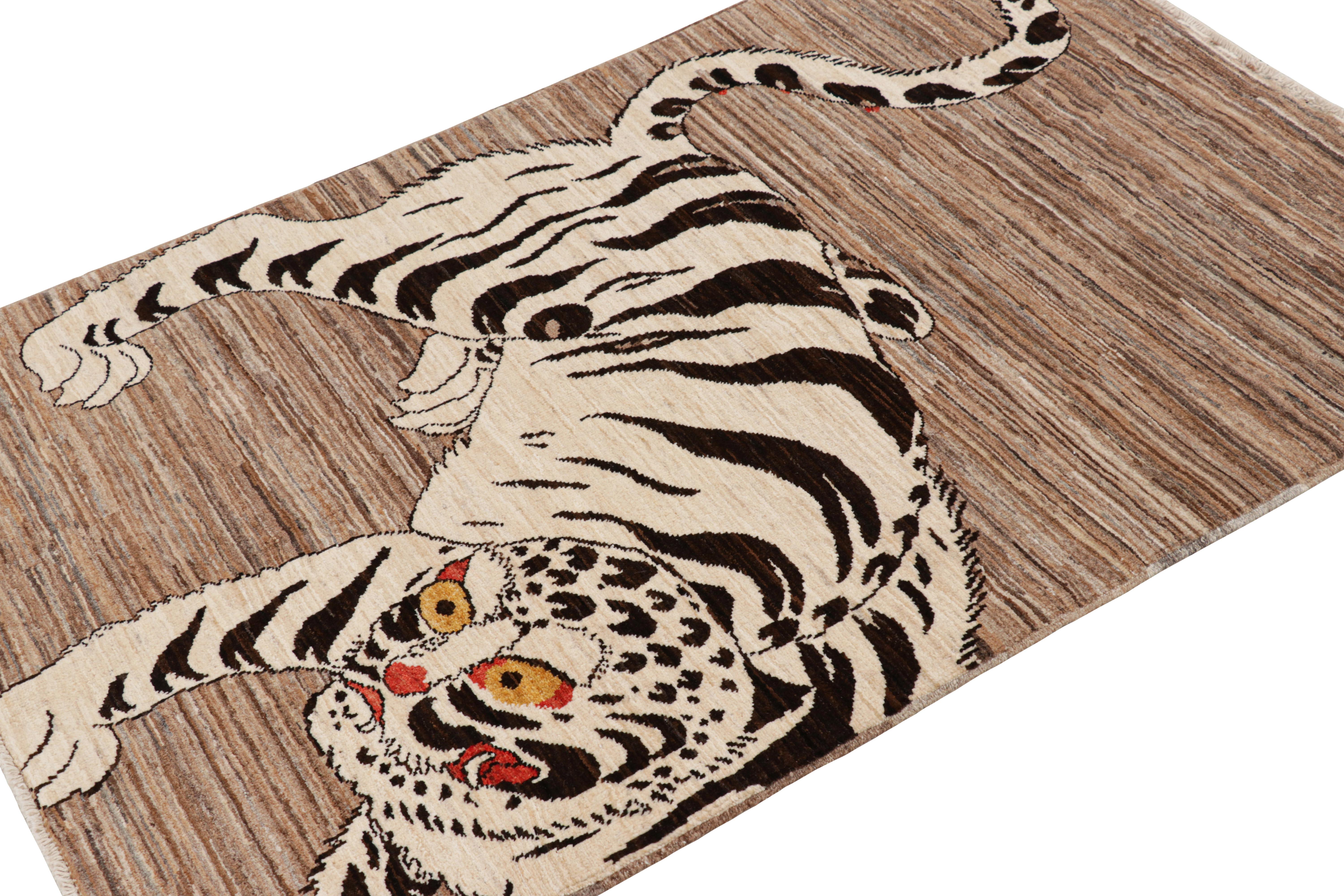 Hand-knotted in wool, this 3x5 modern tiger pictorial rug is a bold addition to the Rug & Kilim Tiger rugs line of their Modern Classics Collection. 

On the Design: 

This particular rug draws on pictorial representations in folk art of white