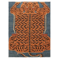 Rug & Kilim’s Contemporary Tiger Rug in Blue with Black and Orange Pictorial