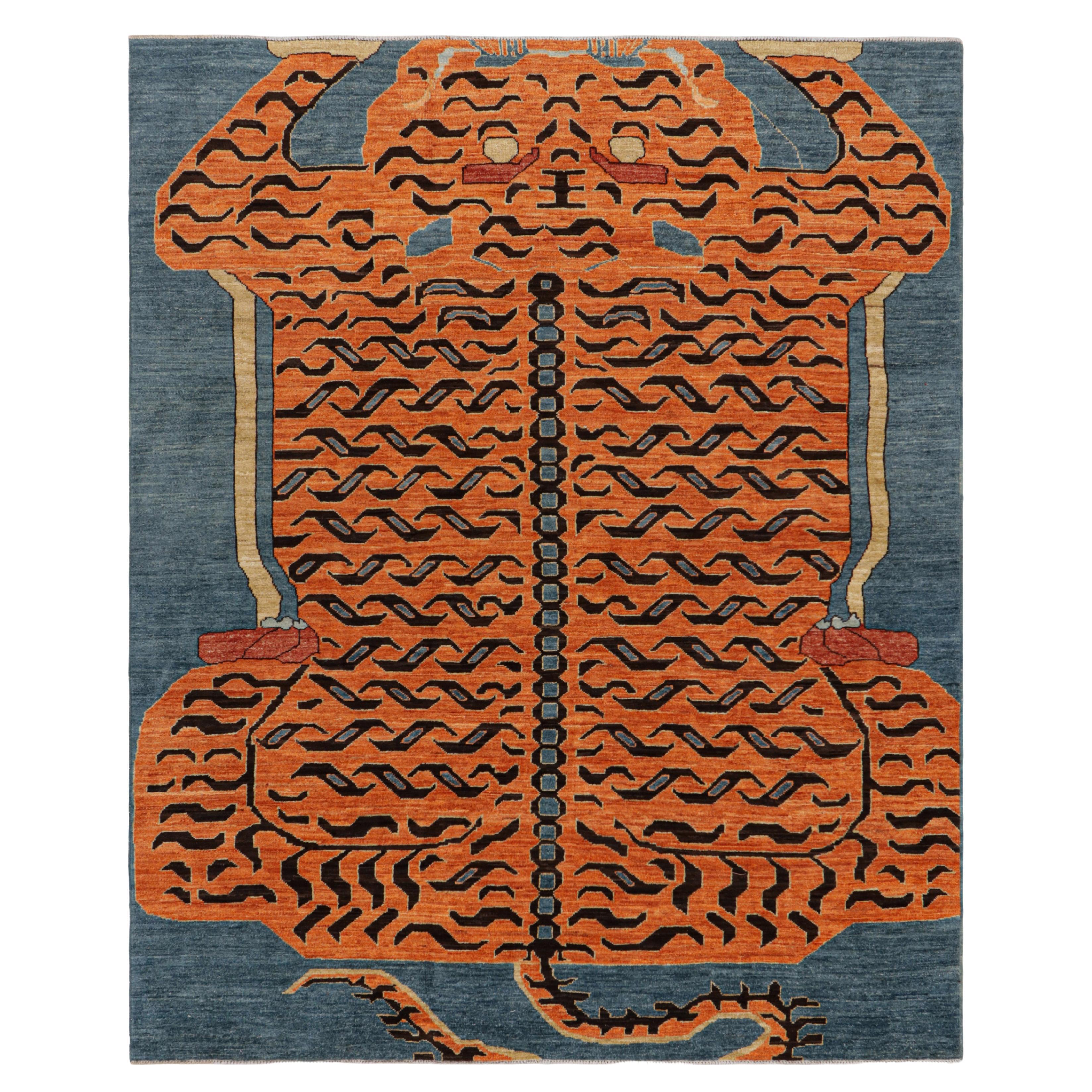 Rug & Kilim's Contemporary Tiger Rug in Blue with Black and Orange Pictorial (tapis tigré contemporain en bleu avec pictogramme noir et orange)