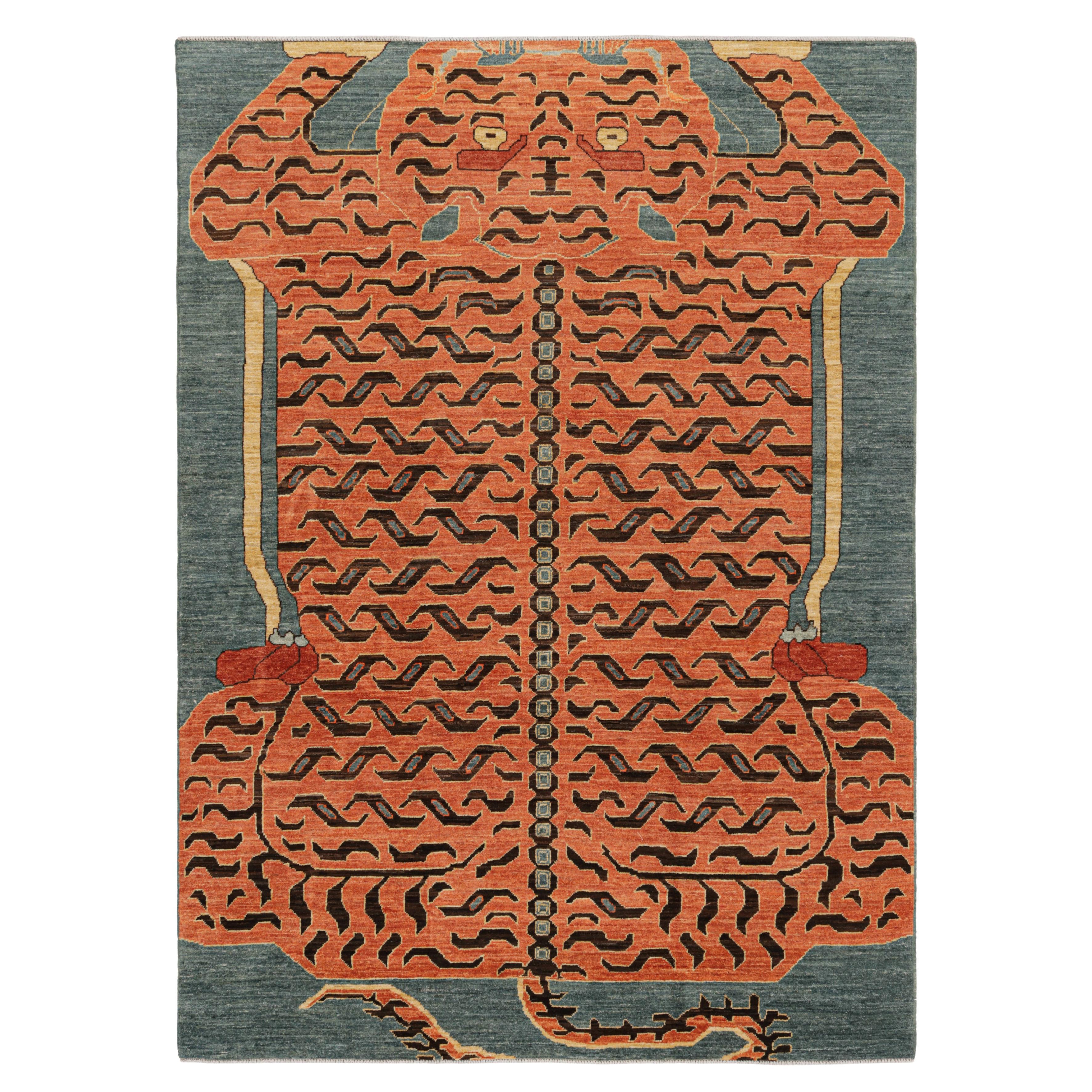 Rug & Kilim's Contemporary Tiger Rug in Blue with Brown and Orange Pictorial (Tapis tigré contemporain en bleu avec pictogramme marron et orange)