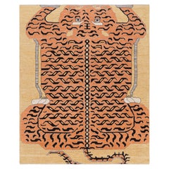 Rug & Kilim’s Contemporary Tiger Rug in Gold with Brown and Orange Pictorial