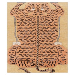 Rug & Kilim’s Contemporary Tiger Rug in Gold with Brown and Orange Pictorial