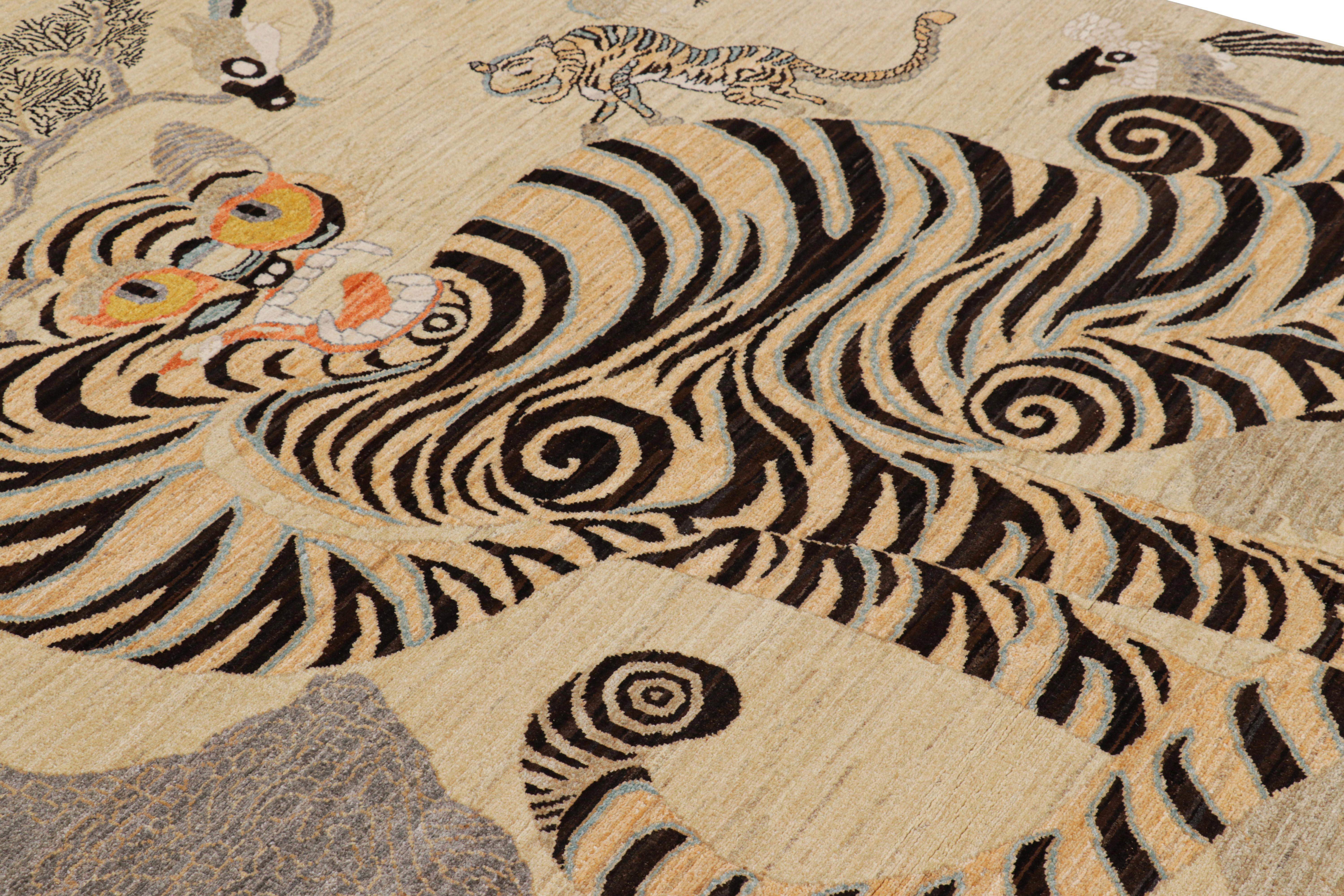 Hand-knotted in wool, this 6x8 modern tiger pictorial rug is a bold addition to the Rug & Kilim exclusive Tiger line.  

On the Design: 

An exemplary drawing with pictorial representation of a tiger, its cubs, and several birds on a tree enjoys