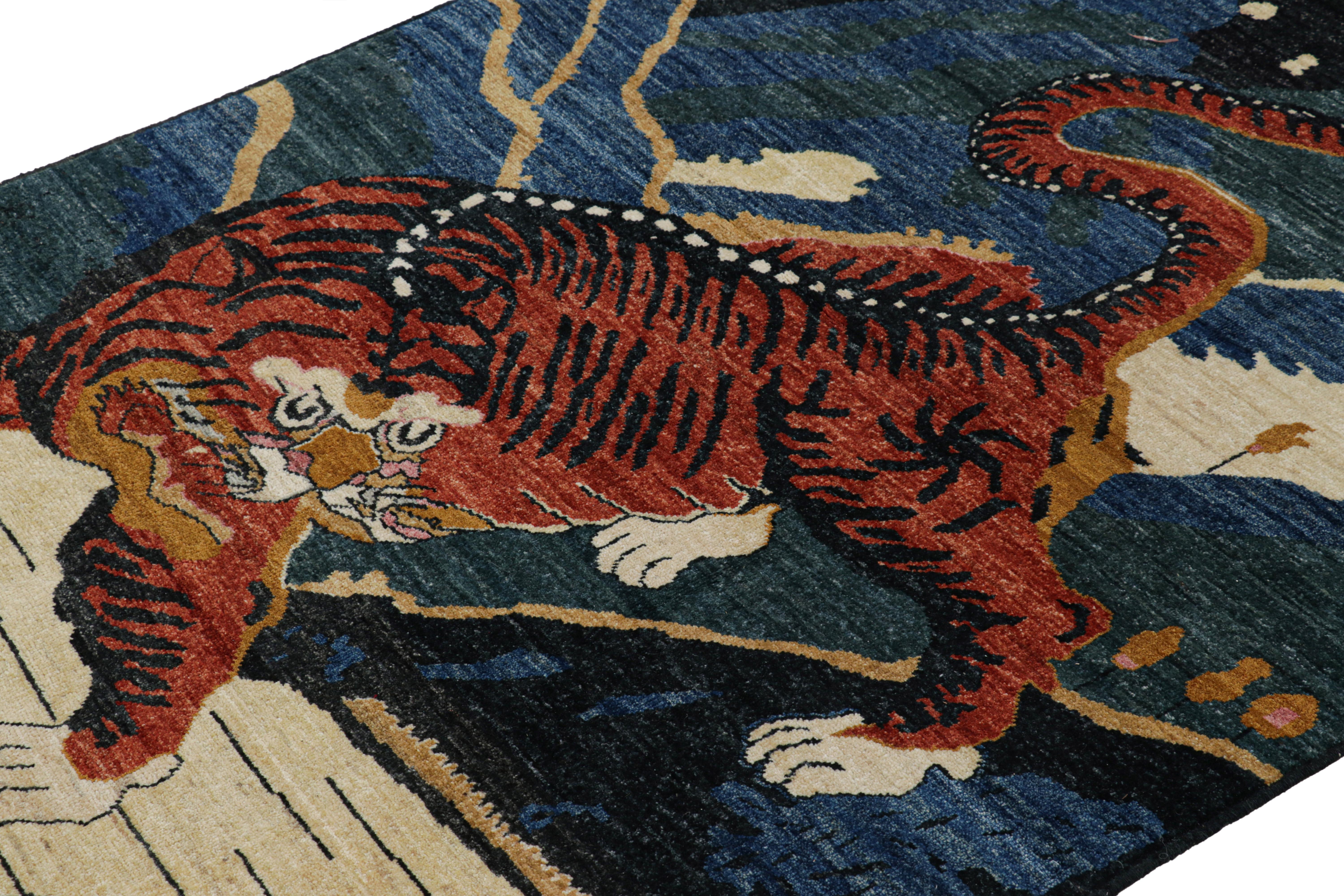 Noué à la main en laine, ce tapis moderne 4x7 à motif de tigre est un ajout audacieux à la ligne Tiger exclusive de Rug & Kilim.  

Sur le Design : 

Un dessin audacieux avec des représentations picturales d'un tigre dans les collines bénéficie de