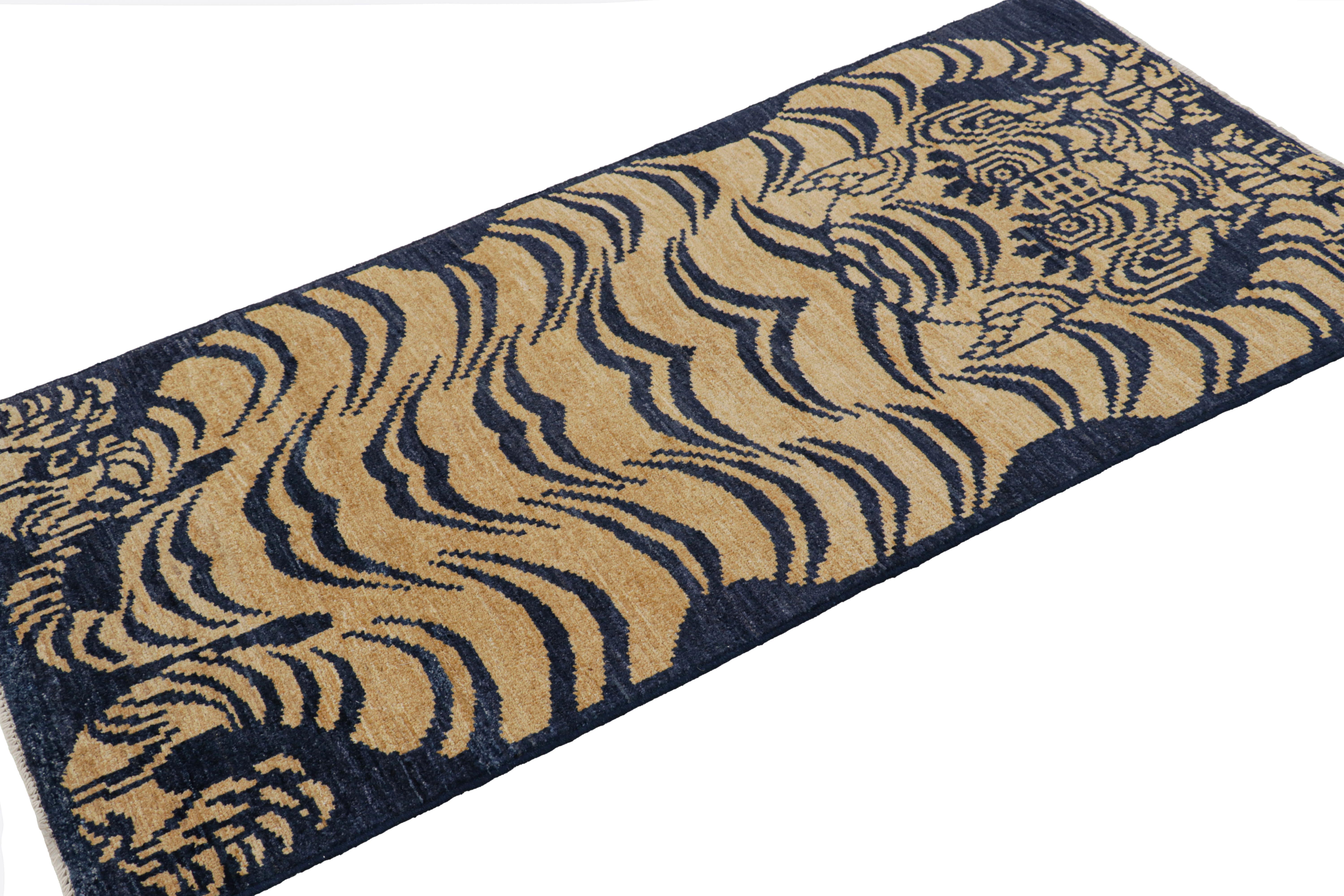 Afghan Rug & Kilim’s Contemporary Tiger Skin Rug in Navy Blue with Gold Pictorial