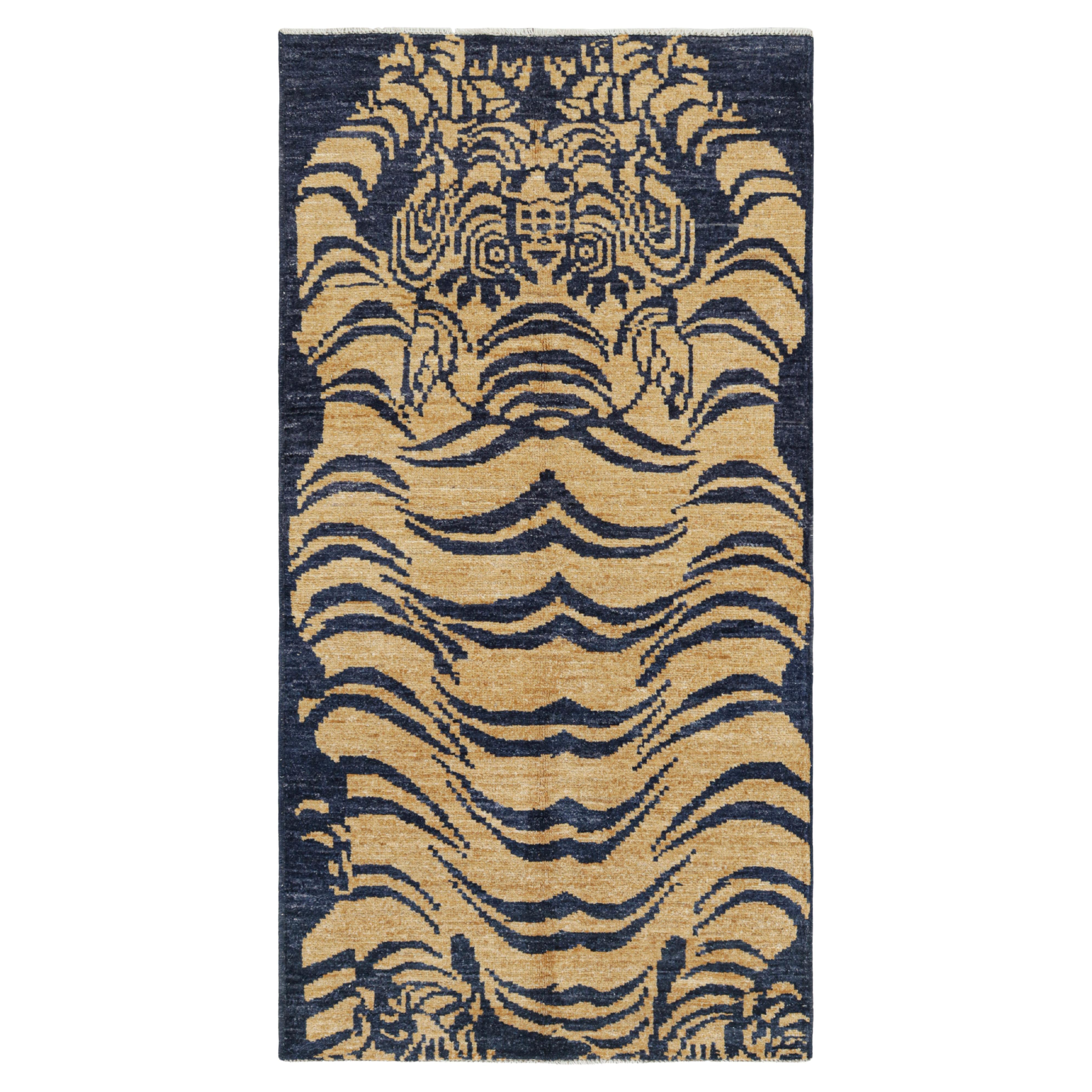 Rug & Kilim’s Contemporary Tiger Skin Runner Rug in Navy Blue & Gold Pictorial