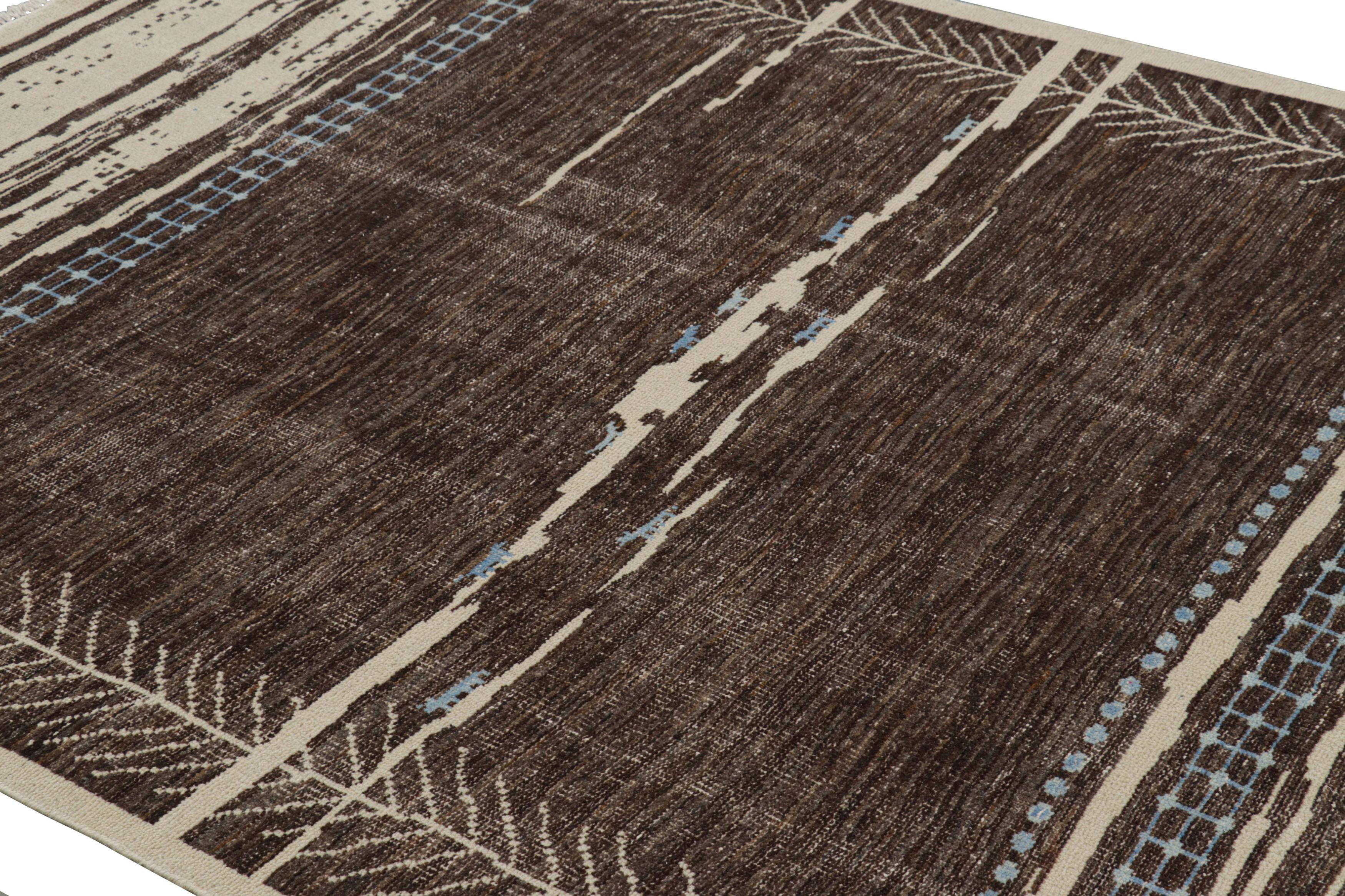 Dieser 6x8 große moderne Teppich aus handgeknüpfter Wolle ist eine Ode von Rug & Kilim an das berühmte marokkanische Teppichdesign, das die Ästhetik der Stämme in einem modernen Stil neu interpretiert.

Über das Design: 

Dieses Design ist eine