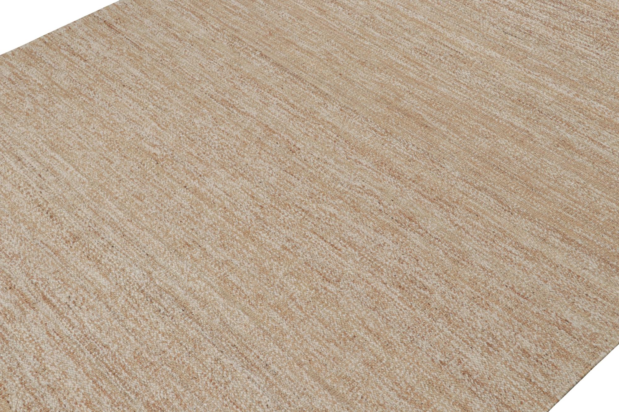 This 10x14 flatweave in contemporary design belongs to Rug & Kilim’s brand new collection - all handwoven in jute.

On the Design: 

The kilim rug enjoys a tasteful boucle-like texture and sense of movement for a more modern take on plain rugs. A