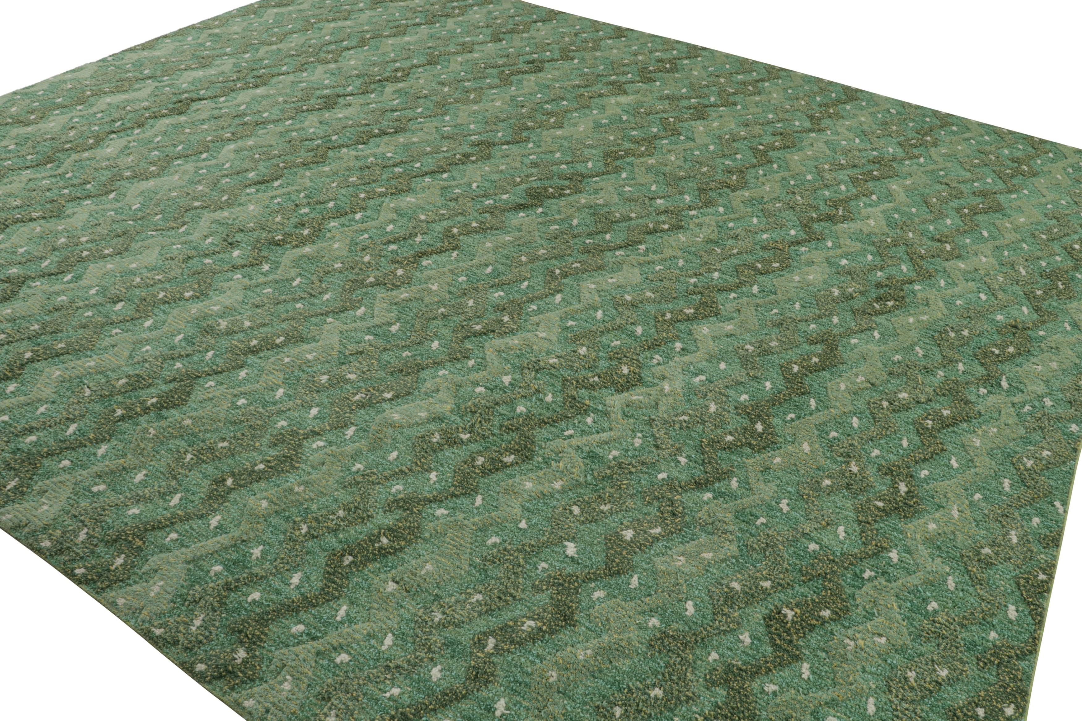 Dieser handgeknüpfte Wollteppich im Format 13x11 in Grün ist eine aufregende Neuheit in der skandinavischen Teppichkollektion von Rug & Kilim.

Über das Design: 

Dieses Design erfreut sich reicher Juwelentöne, Salbei- und Chartreuse-Grün