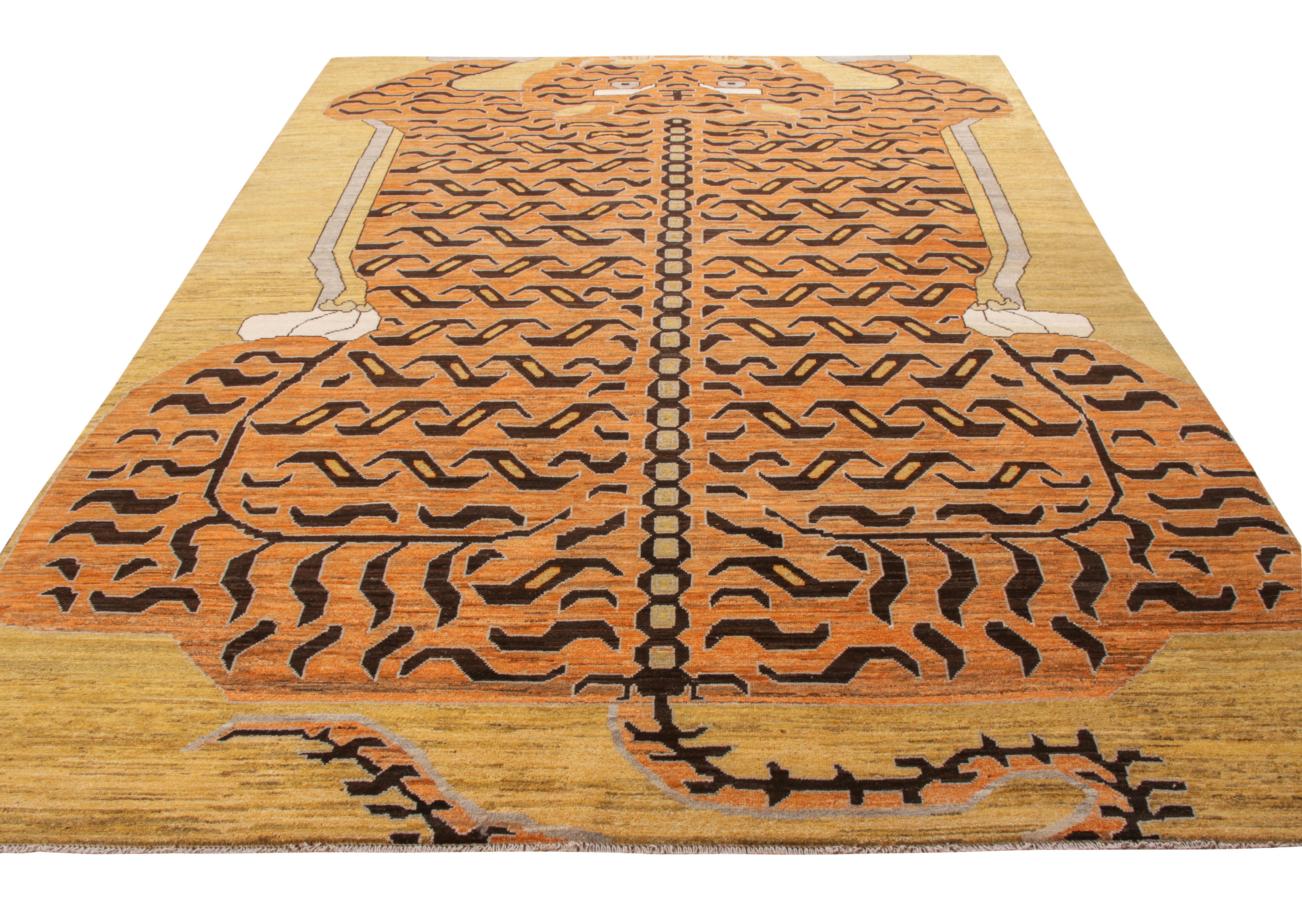 Rug & Kilim presents this custom rug from its Tigers collection. Hand knotted in wool, this rich rug surrounds itself in a commanding aura that is reflected in its pictorial representation of luscious orange with black stripes settling on golden
