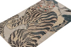 Rug & Kilim’s Custom Tiger-Skin Rug with Beige/Brown, Blue, Black Pictorial