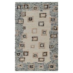 Rug & Kilim's Deco Modern Kilim Rug in White, Blue Border, Geometric Patterns (tapis Kilim déco moderne en blanc, bordure bleue, motifs géométriques)