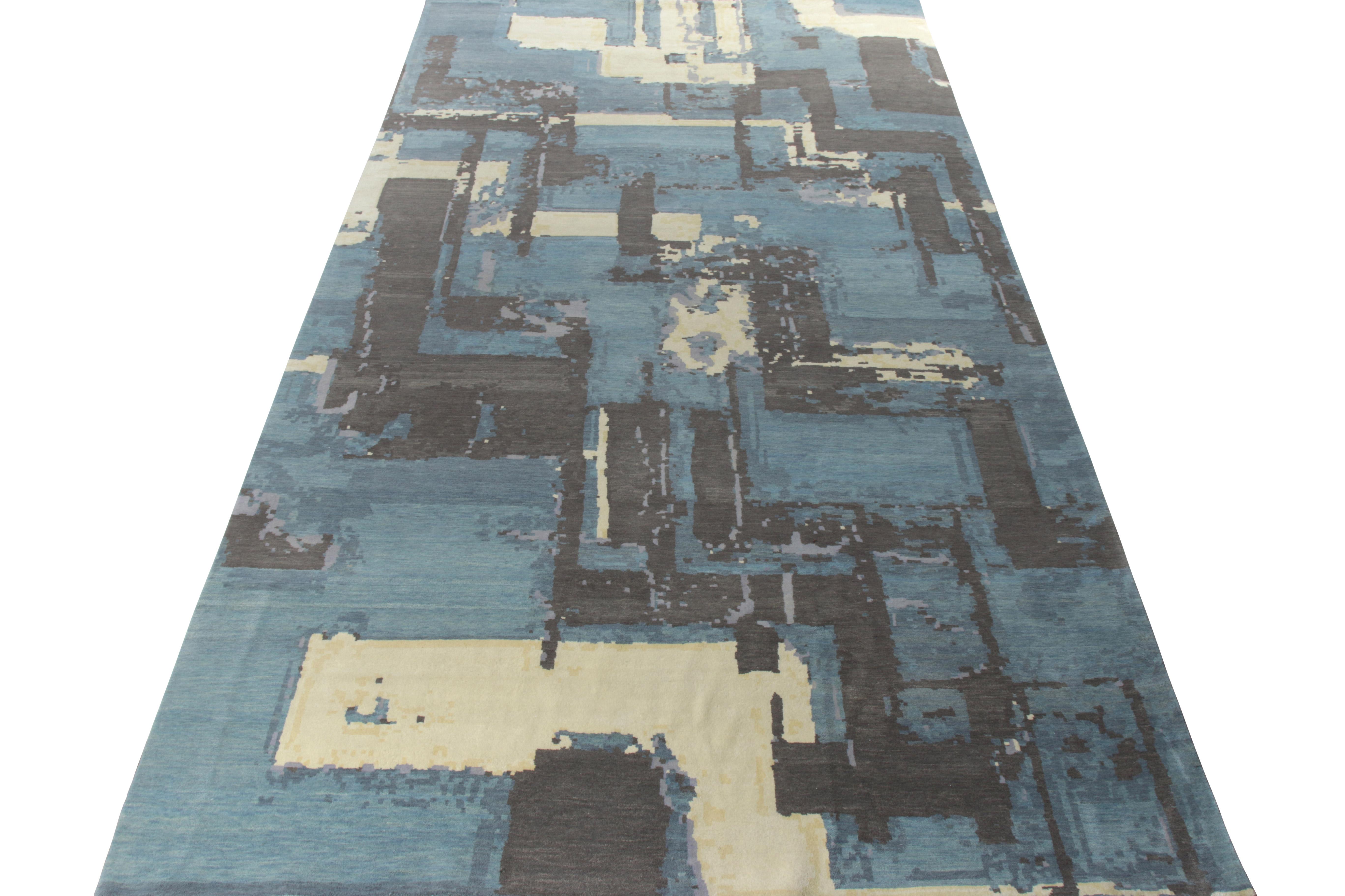 An 8x15 contemporary ode to Deco rug styles from Rug & Kilim’s titular line in the New & Modern Collection. This piece features a scintillating abstract sensibility in the geometric pattern, set in smart blue and black juxtaposed by hints of pale