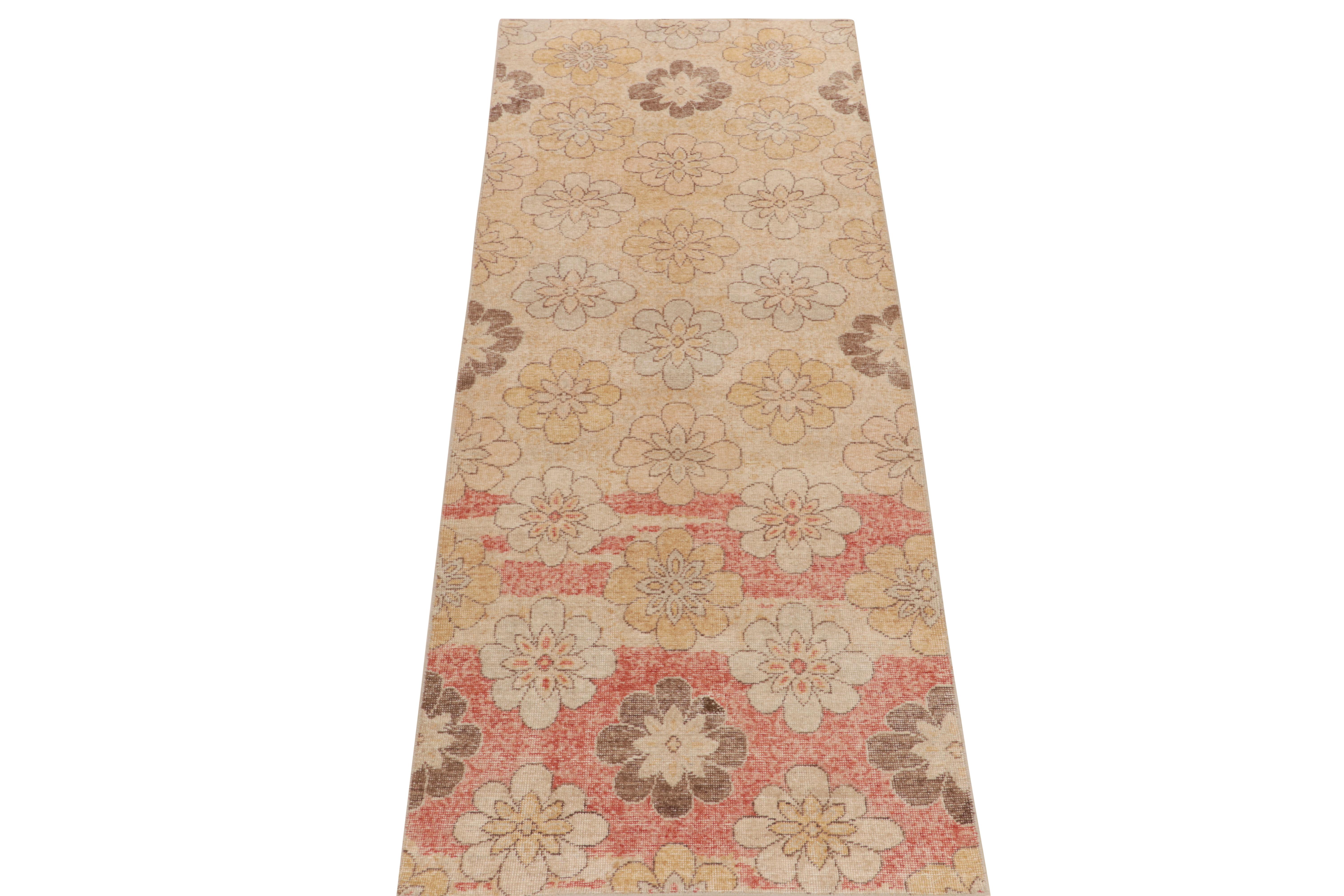 A warm 4x10 distressed style rug from our Homage Collection, inspired by the passionate works of a bold Turkish designer in mid century modern aesthetics. The all over floral pattern enjoys the warmth of gorgeous red, beige, gold & chocolate brown