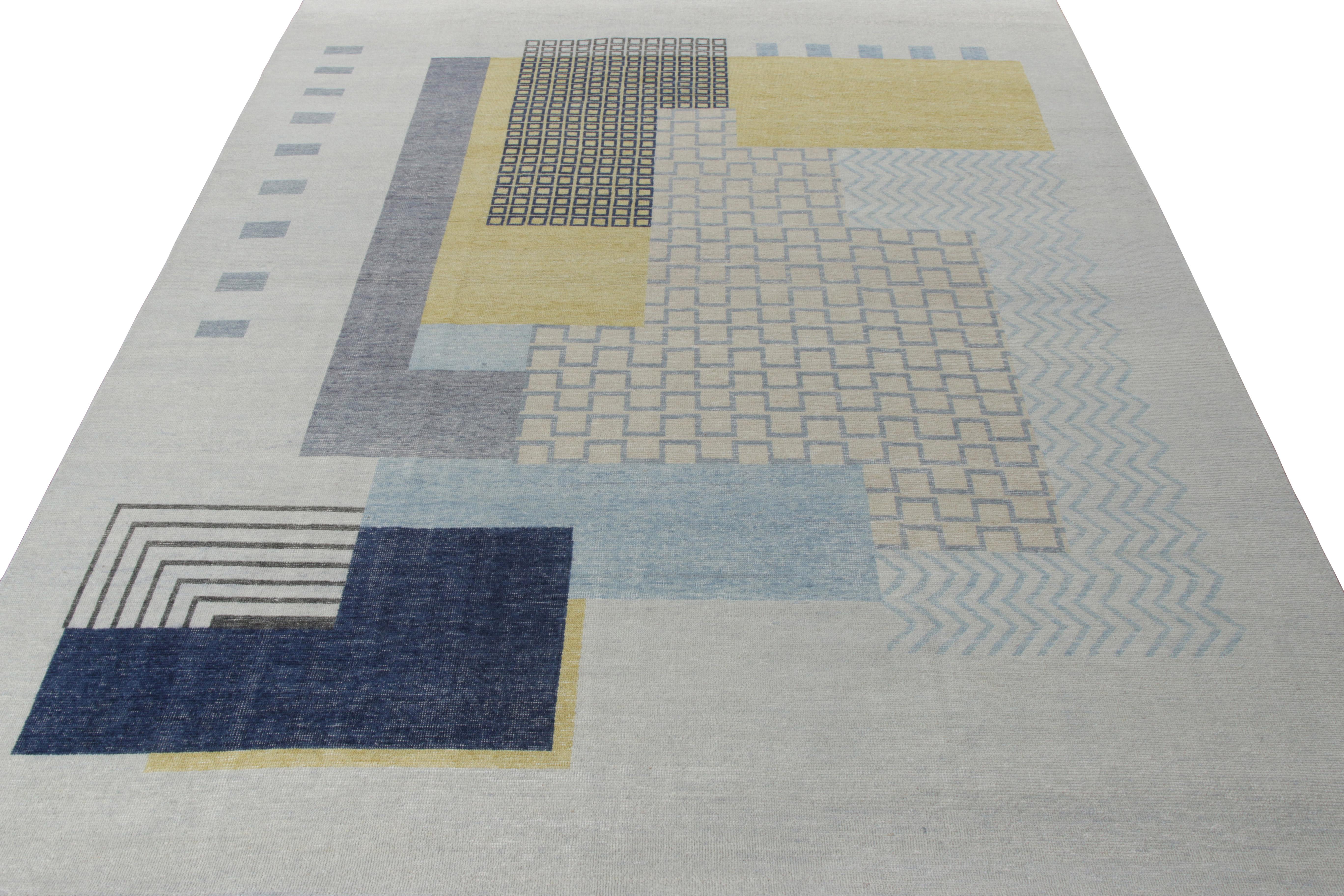 A 9x12 hand-knotted inspiration from Rug & Kilim’s Homage collection. Drawing on French Art Deco sensibilities that transmute themselves in a very modern adaptation of geometry in chic hues of blue, yellow and beige against a soothing gray