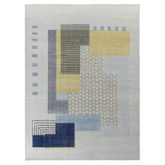 Rug & Kilim’s Distressed Art Deco Style Rug in Blue, Gray Geometric Pattern