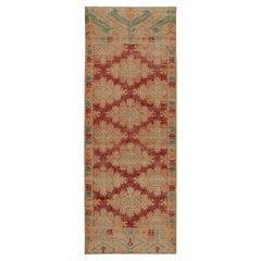 Rug & Kilim’s Distressed Bokhara Style Runner in Red, Beige & Gold Medallions