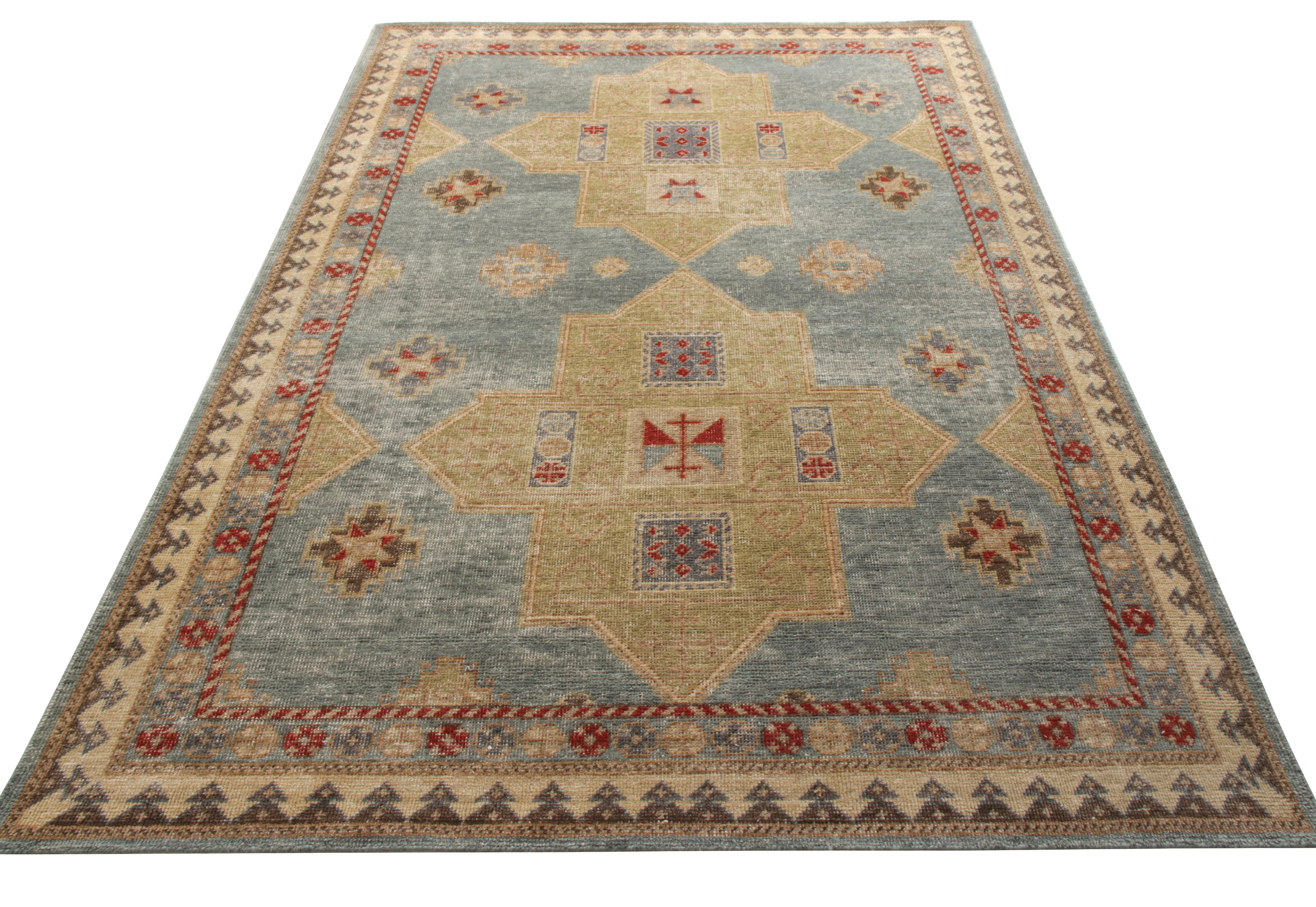 Hand knotted in low-sheared wool, a 6 x 9 from the classic selections belonging to Rug & Kilim’s Homage Collection. The rug witnesses a harmonious union of an all over traditional geometric patterns with a soothing blue and olive green colorway