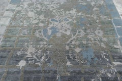 Rug & Kilim’s Distressed Contemporary Floral Rug, in Gray & Blue Hues