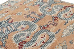 Rug & Kilim’s Distressed Dragon Rug in Blue, Gold and Red Pictorial Patterns