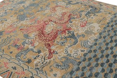 Rug & Kilim’s Distressed Dragon Rug in Blue, Ochre and Red Pictorial Patterns