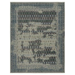 Rug 
Kilim è un tappeto europeo invecchiato in blu e verde acqua con motivi floreali.