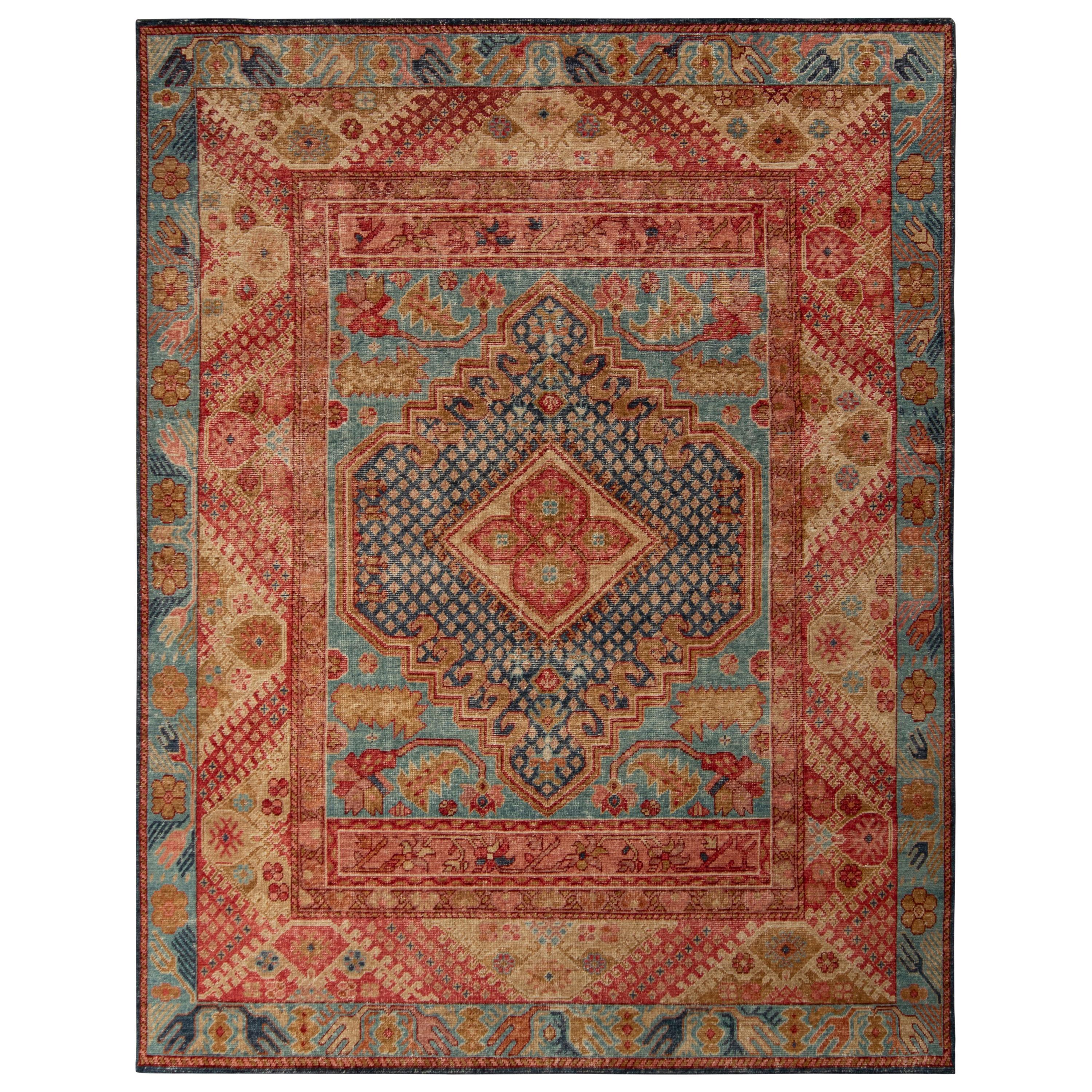 Rug & Kilim’s Distressed Ghiordes Style Rug in Blue and Red Medallion Pattern